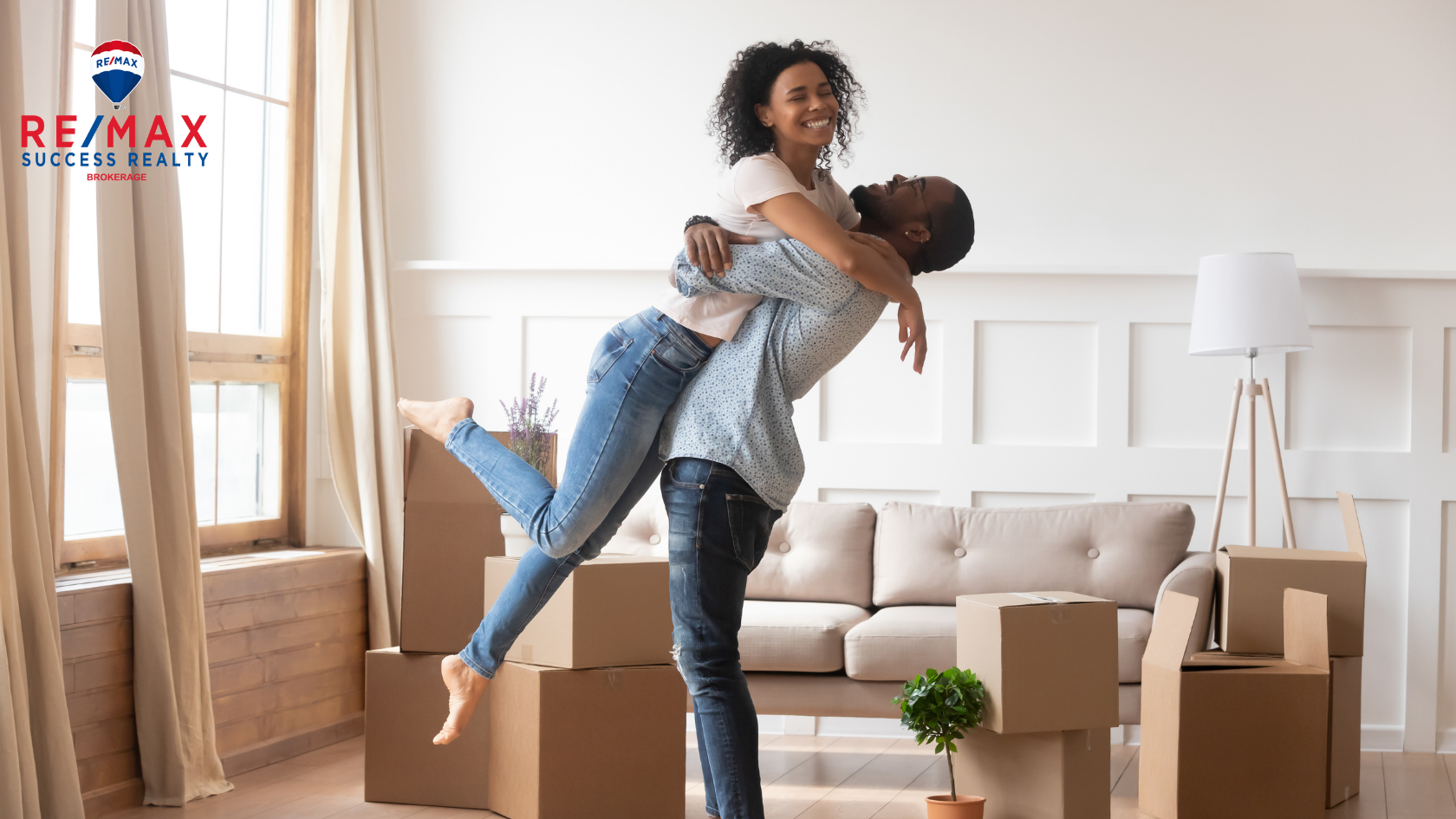 happy home buyers moving into their new home