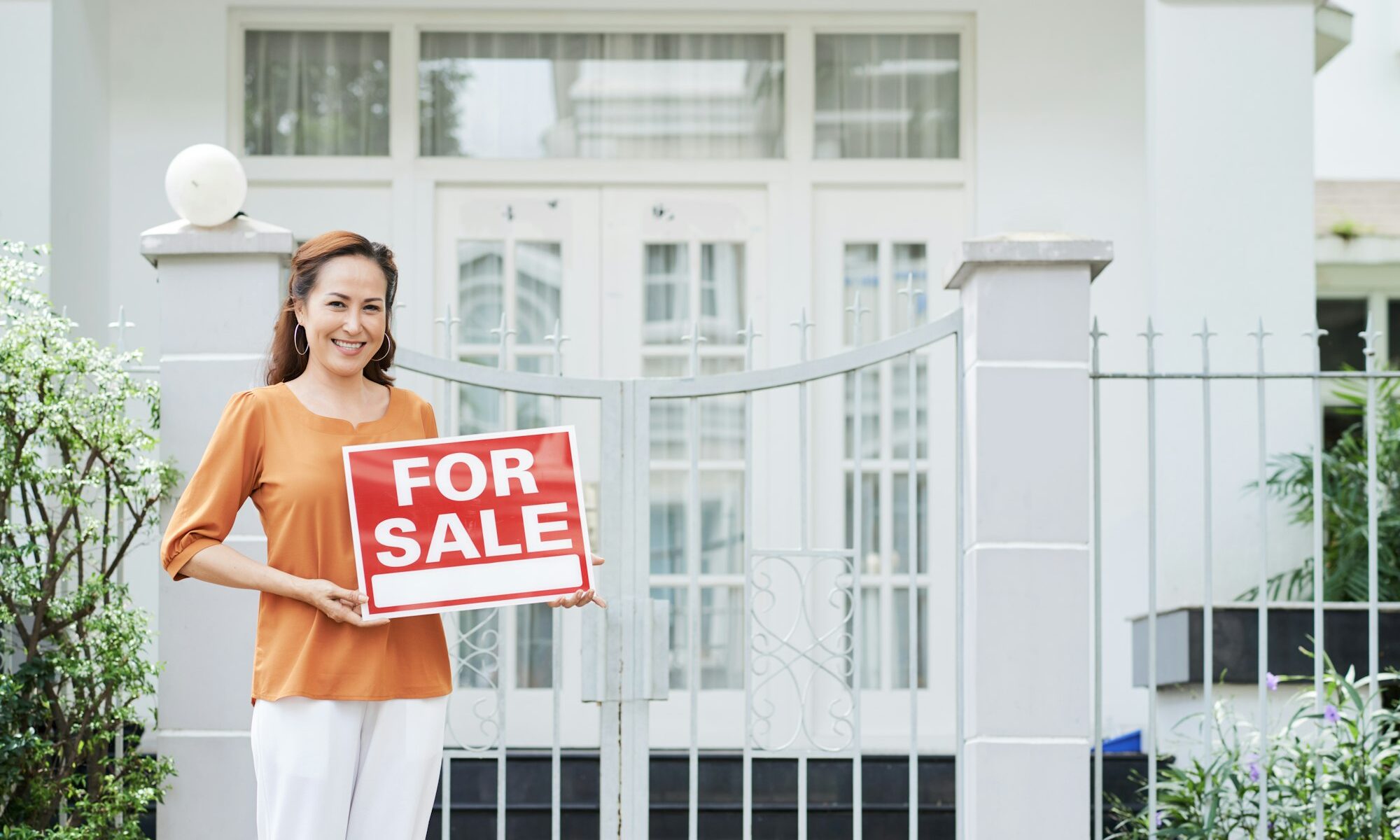 Woman Selling Her House - RE/MAX Success Realty